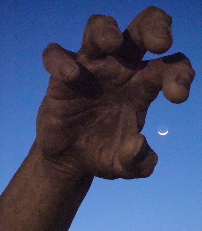 Moon and hand