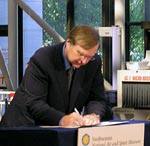 Allen signs document