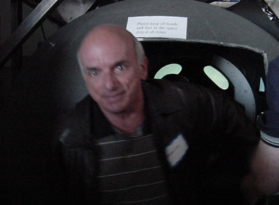 Dennis Tito emerges from simulator